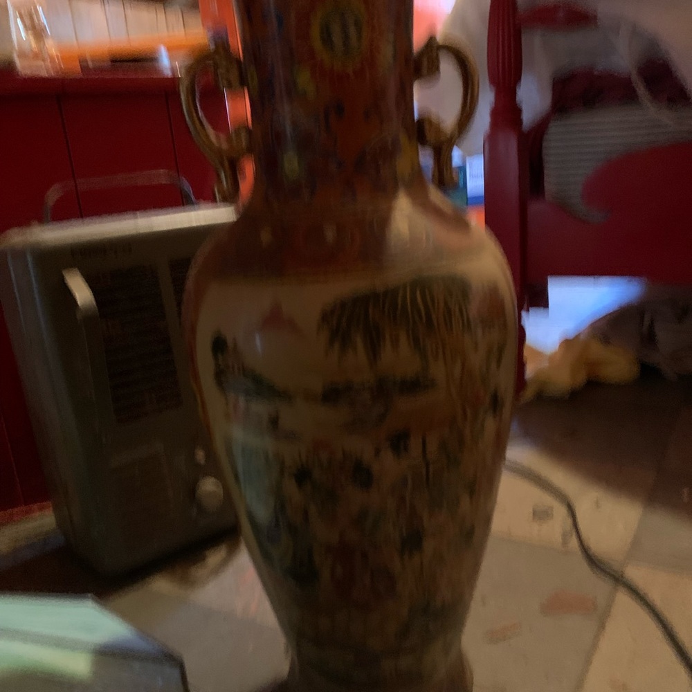 Beautiful antique vase.  About 2 1/2 ft tall.   Must go asap. Moving